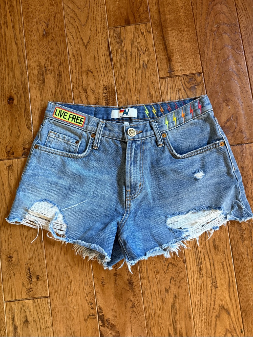 Aviator Nation distressed light blue denim shorts lightning bolts size 26